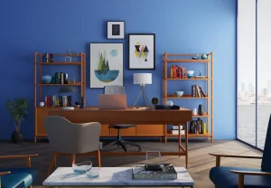 Sala de escritório moderna com decoração em tons de azul, móveis de madeira e obras de arte na parede, refletindo tendências de decoração para 2025.